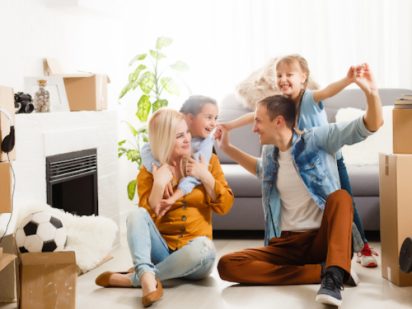 Family happy after moving in to new home