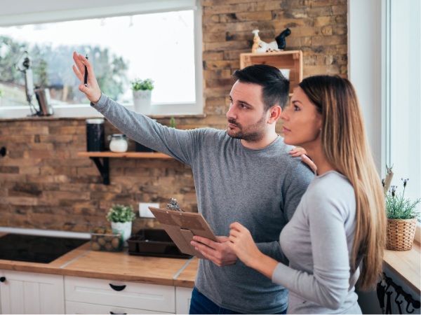 couple deciding what they need to upgrade in their kitchen