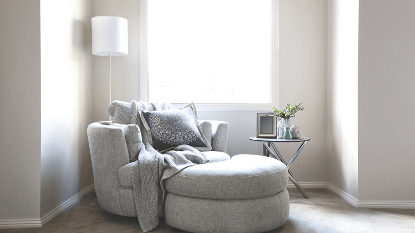 light grey curved couch