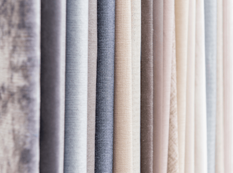 rolls of textured fabric and material