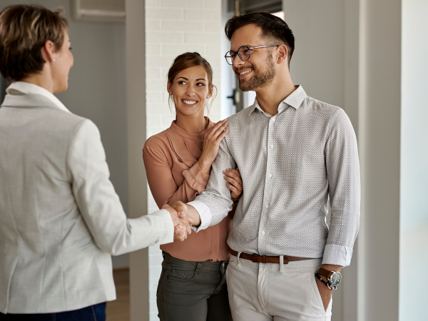 property practitioner shaking hands with potential tenant