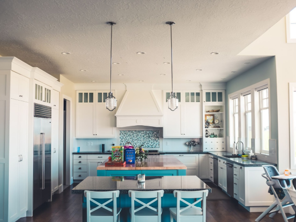 green and white beach style kitchen