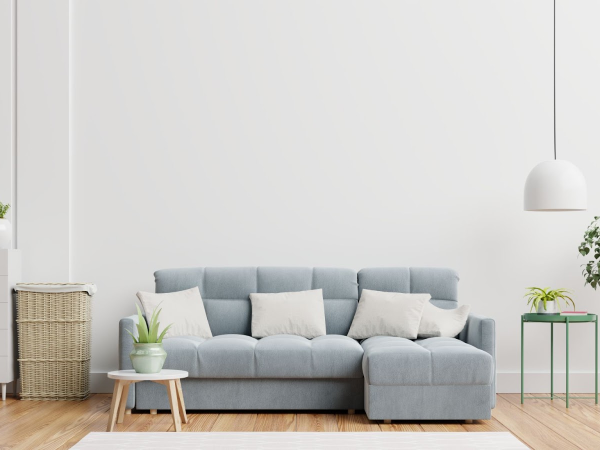 Grey couch with white pillows
