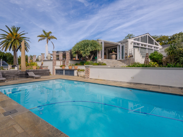 view of rental property exterior in Constantia Upper with spacious pool